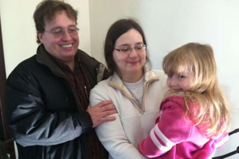 Todd and Tamara Molloy and daughter Laura, 5, will use a house owned by church members after repairs by volunteers.