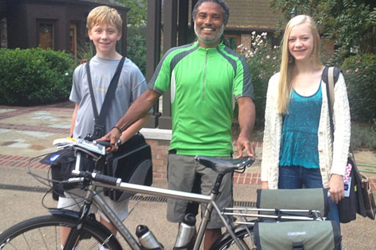 Erick Cedeno with Lawson Mabry’s children, Elizabeth and Will. (Mabry is the man who hosted Erick through WarmShowers.org and showed him the historical ledgers from his family’s slave-owning days)PHOTO: Courtesy Erick Cedeno