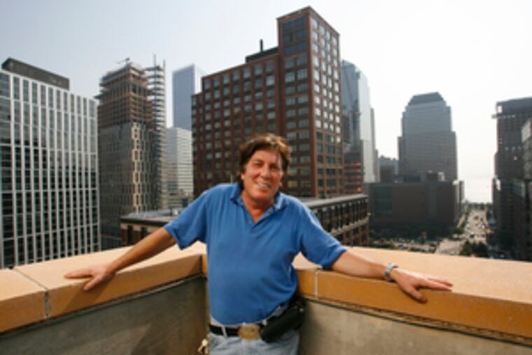 Tom Bulger on the roof of Stuyvesant High School, where he works, about four blocks from the World Trade Center. Go to http://go.philly.com/detox for an online exclusive on Bulger and three others who went through the detoxification program.