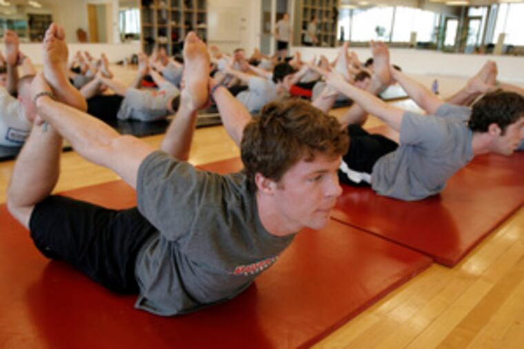 Grant Firestone and the rest of his Haverford College lacrosse team organize Sunday yoga sessions themselves and pay for them out of their own pockets.