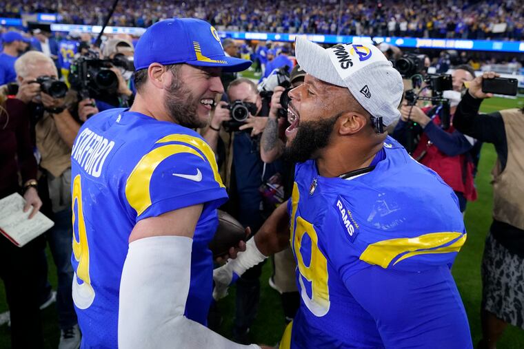 Rams quarterback Matthew Stafford (left) and defensive tackle Aaron Donald celebrating during their Super Bowl season of 2021.