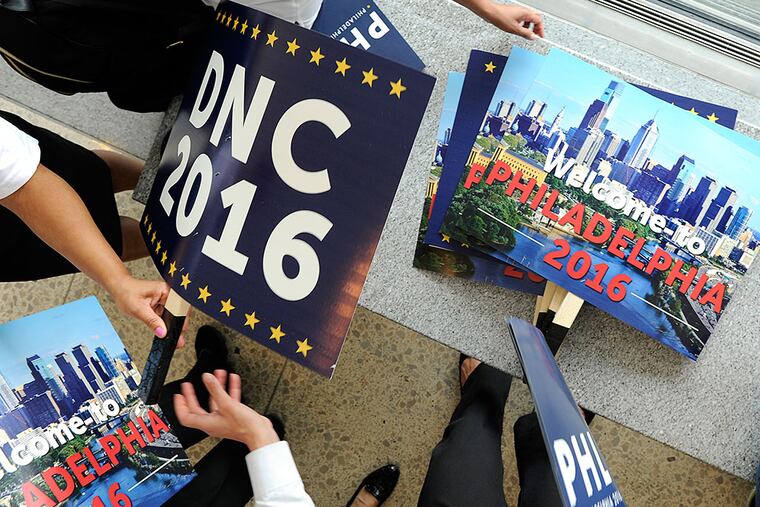 Placards pushed to bring the Democratic National Convention to Philadelphia in 2016. TOM GRALISH / Staff Photographer