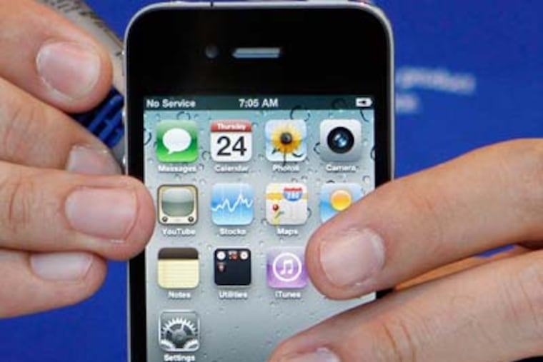 The new Apple iPhone 4. Consumer Reports found reception problems caused by its antenna design. (ALAN DIAZ / Associated Press)
