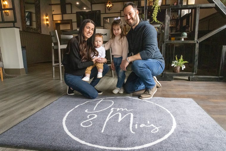 Jenna and Steve DeVito with children Vincenzo, 9 months, and Emma, 3, at their restaurant, Dom & Mia’s, at 145 Saxer Ave. in Springfield.