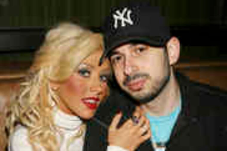 In happier times: Christina Aguilera and husband, Jordan Bratman, in 2007. Now the unlikely couple are a twosome no more.