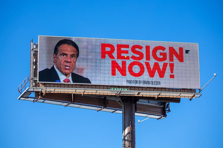 A billboard urging New York Gov. Andrew Cuomo to resign is seen near downtown Albany, N.Y., in March. On Tuesday, Cuomo resigned from office, effective in 14 days, following allegations of sexual harassment.
