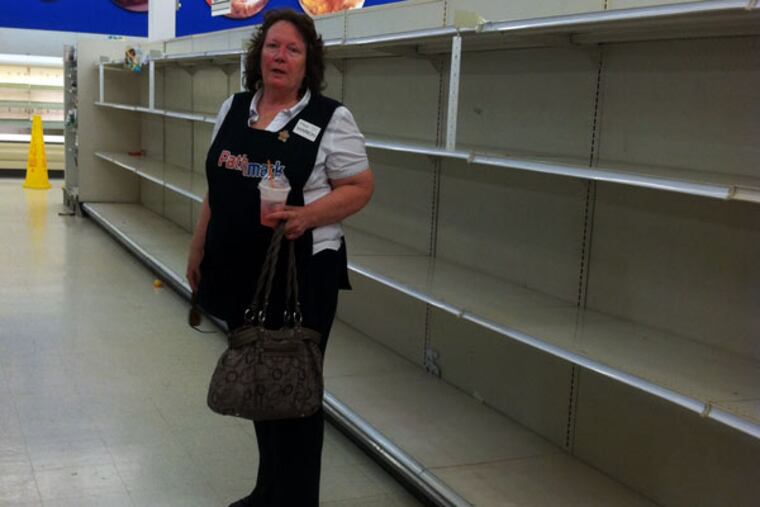 Marion Riley, who has more than 20 years’ seniority, will lose her job Friday when the Pathmark on Cottman Avenue in Northeast Philadelphia closes. Some workers are luckier, though. (JANE VON BERGEN/Inquirer Staff)