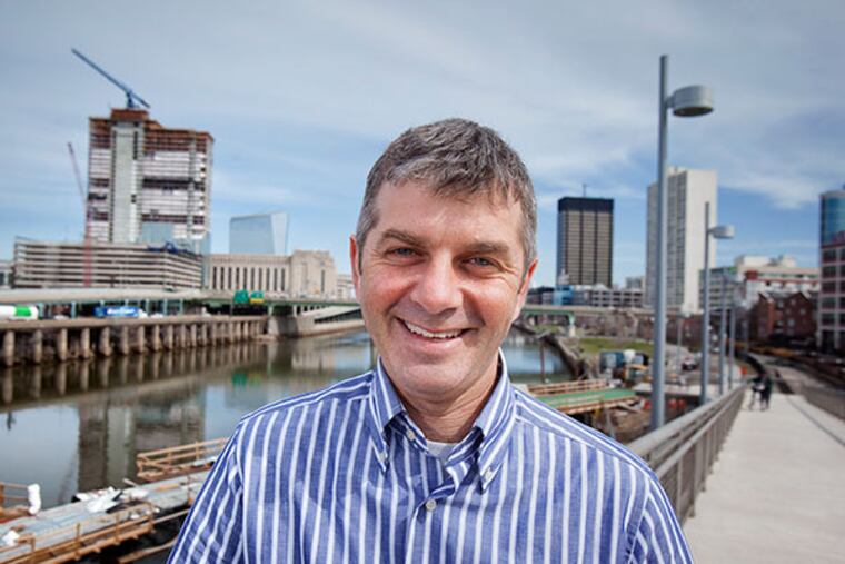 Environmental documentarian Ben Kalina on the Schuylkill River Trail overlooking the Schuylkill River on Thursday, April 3, 2014. (ED HILLE / Staff Photographer)