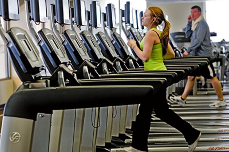 Virtua Health's Health and Wellness Center includes a same-day surgery center, an express-care center, and a fitness center with indoor track, trainers, and heated pools. (David M Warren / Staff)
