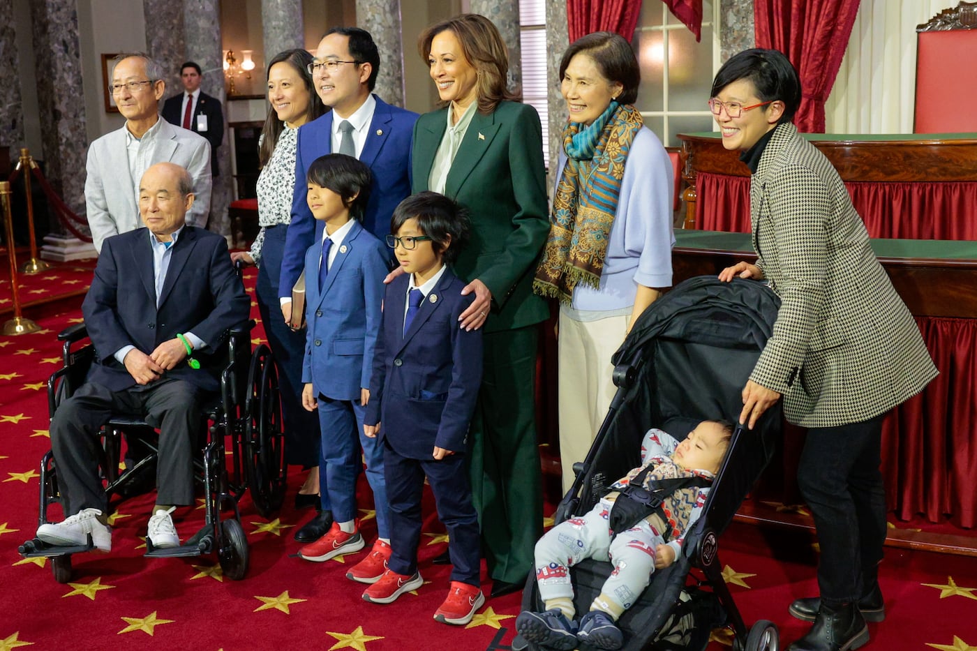 Sen. Andy Kim (D., N.J.) poses with his family and Vice President Kamala Harris after taking the ceremonial oath of office in the old Senate chamber on Jan. 3, 2025, in Washington.