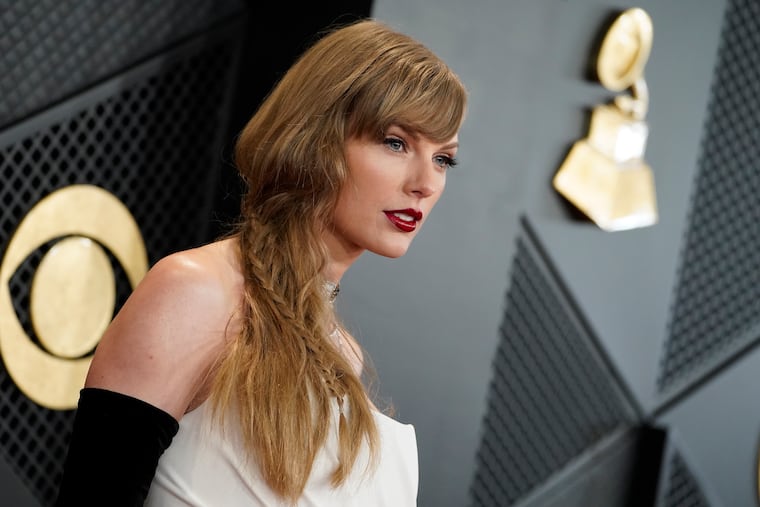 Taylor Swift arrives at the 66th annual Grammy Awards earlier this month in Los Angeles.