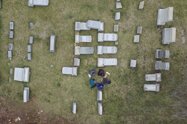 View from above of the 75 to 100 toppled headstones at Mount Carmel Cemetery Monday February 27, 2017.