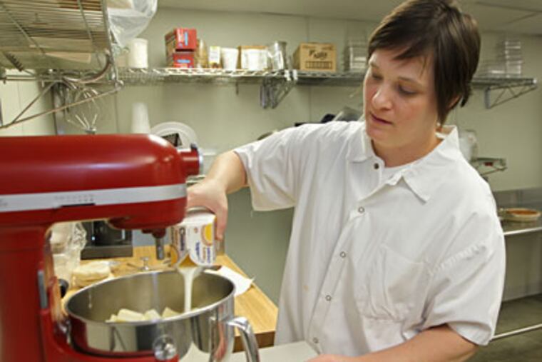 Erin O'Shea getting into the mashed potatoes.