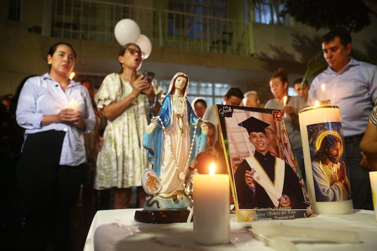 Friends and relatives hold a vigil Tuesday for Johan Sebastián Durán Guerrero at his family home in Bucaramanga, Colombia. He was fatally shot by an Immigration and Customs Enforcement officer in Maine on Monday.