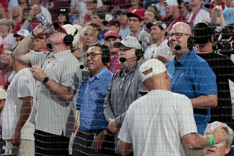 (From left) Phillies broadcasters Ben Davis, Ruben Amaro Jr., John Kruk, and Tom McCarthy, who did their broadcast from behind home plate Tuesday.