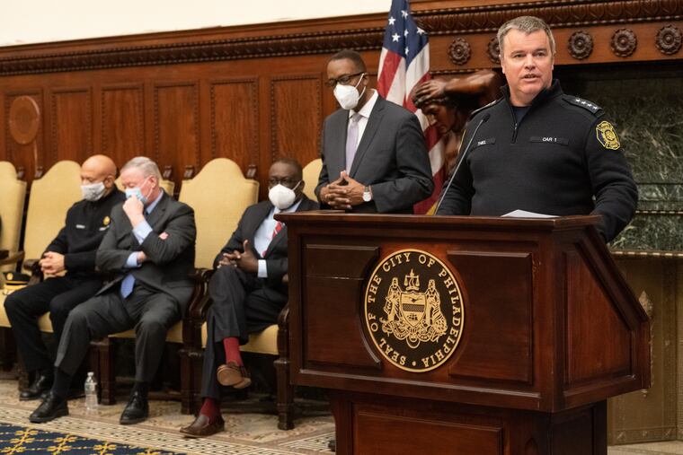 Fire Commissioner Adam Thiel, front right, at a press conference at City Hall where city officials released preliminary findings of the investigation of the fatal fire in Fairmount, in Philadelphia, January 11, 2022.