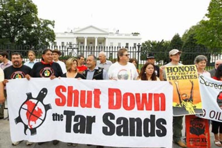 Demonstrators protesting the Keystone XL pipeline project on Sept. 2 at the White House. Police arrested about 1,200.