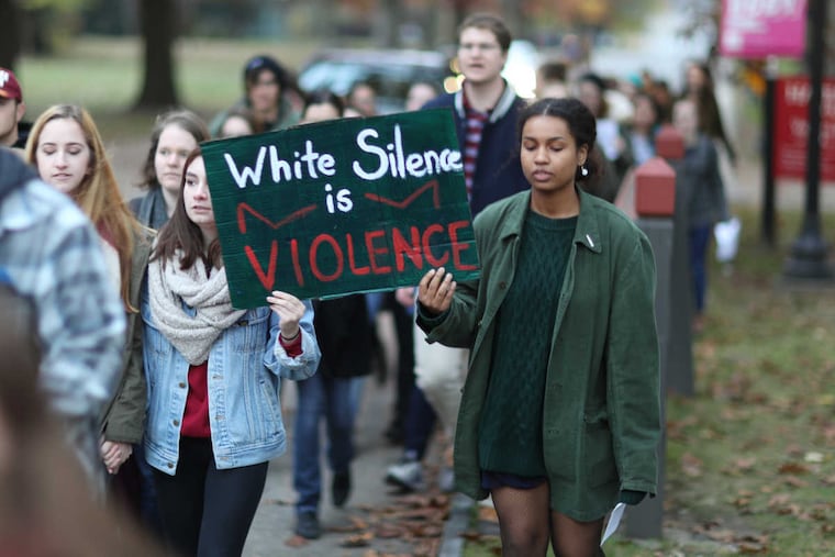 About 40 protesters walked and chanted from Haverford College to the Lower Merion Township building in Ardmore Wednesday November 16, 2016.