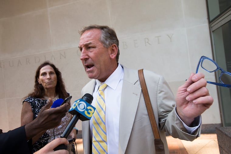 A file photo shows attorney Michael van der Veen speaks to reporters outside federal court in Philadelphia on Aug. 1, 2019, after his client Justin Hiemstra, 22, an ex-Haverford College student, pleaded guilty to trying to hack into IRS computers to get Donald Trump's tax returns. Hiemstra was to be sentenced Monday.
