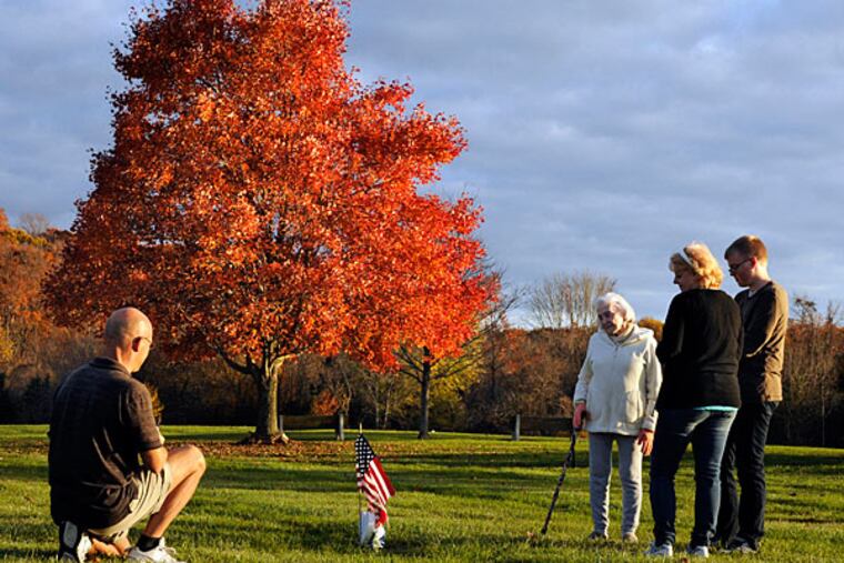 Therese Hall, 93, of Jacksonville, N.J., at Brig. Gen. William C. Doyle Veterans Memorial Cemetery in North Hanover Twp., with Kevin and Teresa Welsh of New Egypt and their son Noah, 15.