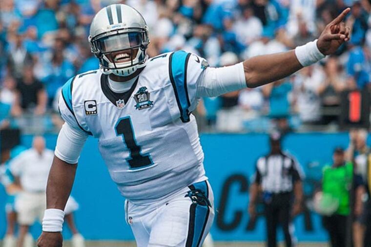 Carolina Panthers quarterback Cam Newton (1) celebrates after throwing a touchdown pass during the third quarter against the Detroit Lions at Bank of America Stadium. Carolina defeated Detroit 24-7. (Jeremy Brevard/USA Today)
