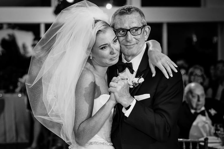 Mr. Katz dances with his daughter, Rose, at her wedding.