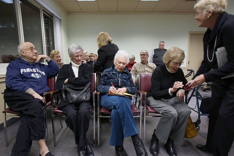 (Left to right) Steven Strauss, Georgine Kelly, Marcia Halbert, Marilyn Greenberg and Betty Goldfied sign the petition at mayoral candidate Lynne Abraham's petition kick-off party at Kennedy House in Philadelphia on Tuesday, February 17, 2015. ( STEPHANIE AARONSON / Staff Photographer )