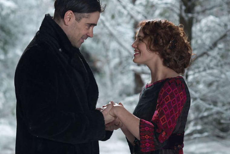 Jessica Brown Findlay, right, and Colin Farrell in a scene from "Winter's Tale." (AP Photo/Warner Bros., David C. Lee)