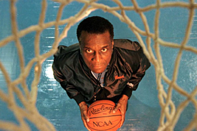 Alonzo Lewis as coach of Cheyney University in 1996. He also coached at Chester High and played at La Salle.