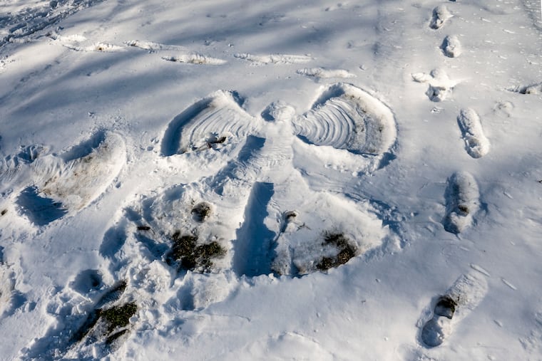 A snow angel remains after a snowstorm last January.
