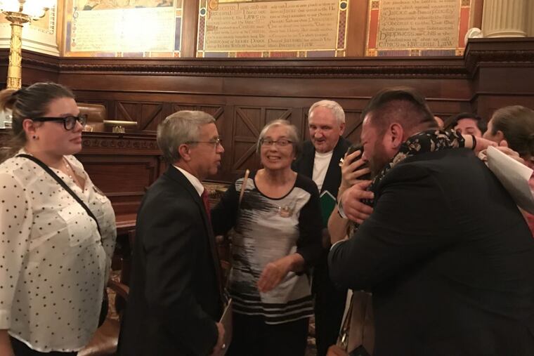 Lawyer Stephen Grose (second from left) with Tina Brosius’ parents Lorraine and Ernest Brosius to his right, after the decision.