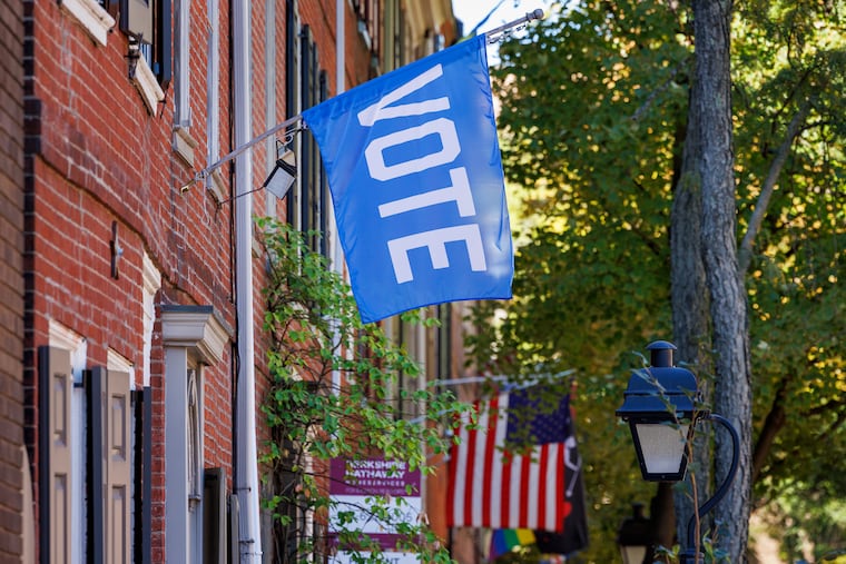 A "Vote" flag outside a home on the 500 Block of Delancey Street.