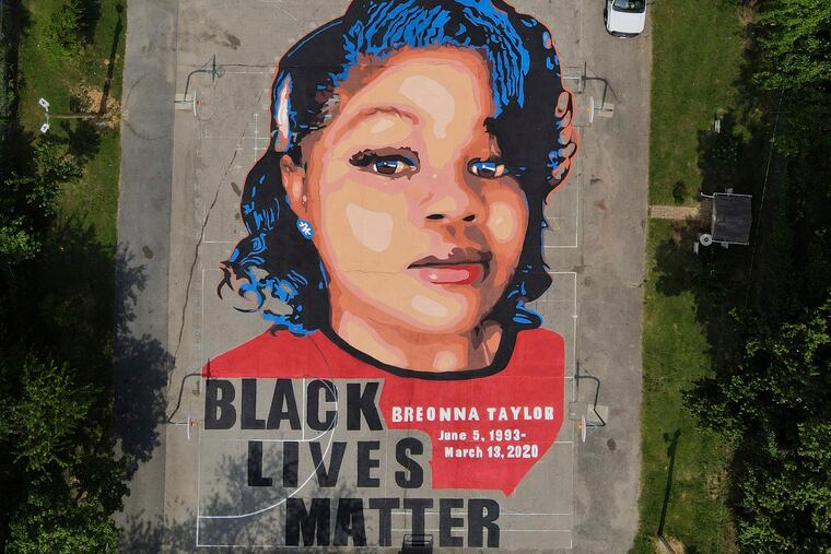 In this aerial view, a mural depicting Breonna Taylor covers the surface of a basketball court at Chambers Park in Annapolis, Md. in July 2020. Taylor, a 26-year old Black woman, was fatally shot in March 2020 by police who were executing a warrant at her Louisville, Ky., apartment.