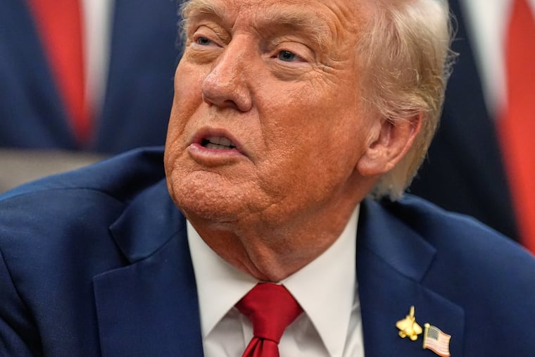 President Donald Trump speaks in the Oval Office of the White House before signing an executive order regarding childhood cancer and the use of AI, Tuesday, Sept. 30, 2025, in Washington.