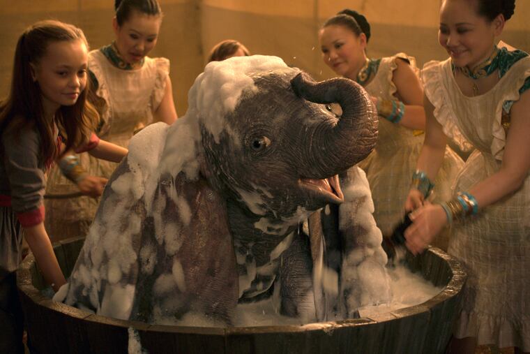 This image released by Disney shows Nico Parker, left, in a scene from "Dumbo." (Disney via AP)
