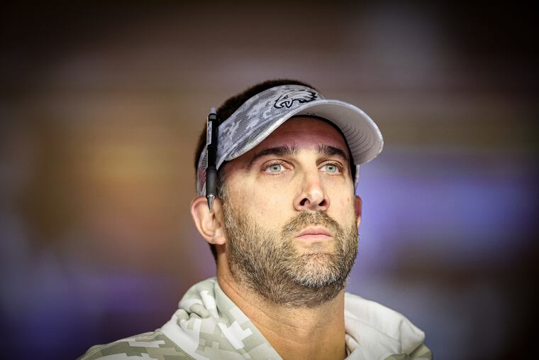 Philadelphia Eagles head coach Nick Sirianni walks on to the field before beating the Cowboys, 34-6, at AT&T Stadium on Sunday.