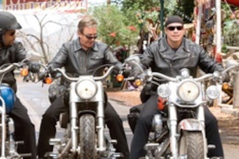 "Wild Hogs" Martin Lawrence (left), Tim Allen, John Travolta, firing all their guns at once. For all the gay and black jokes and cliches, it's not bad.