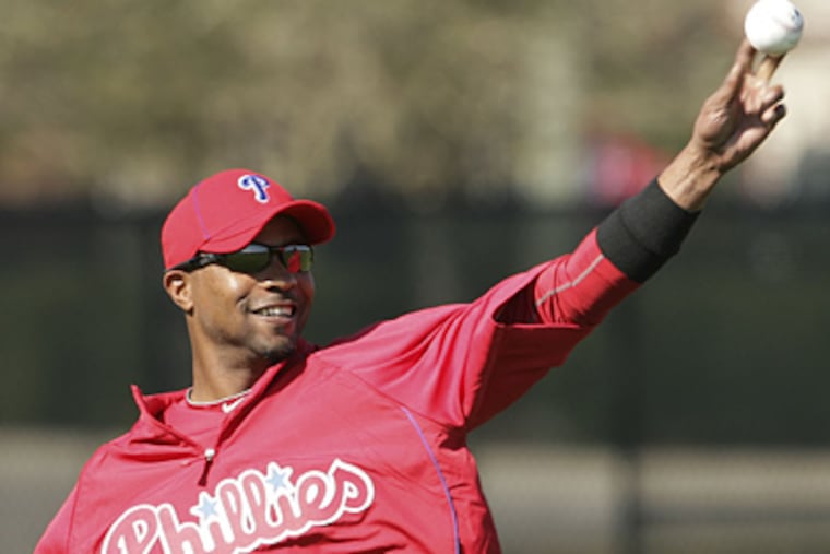 Phillies' outfielder Dewayne Wise preserved Mark Buehrle's perfect game with the White Sox last season. (Yong Kim / Staff Photographer)