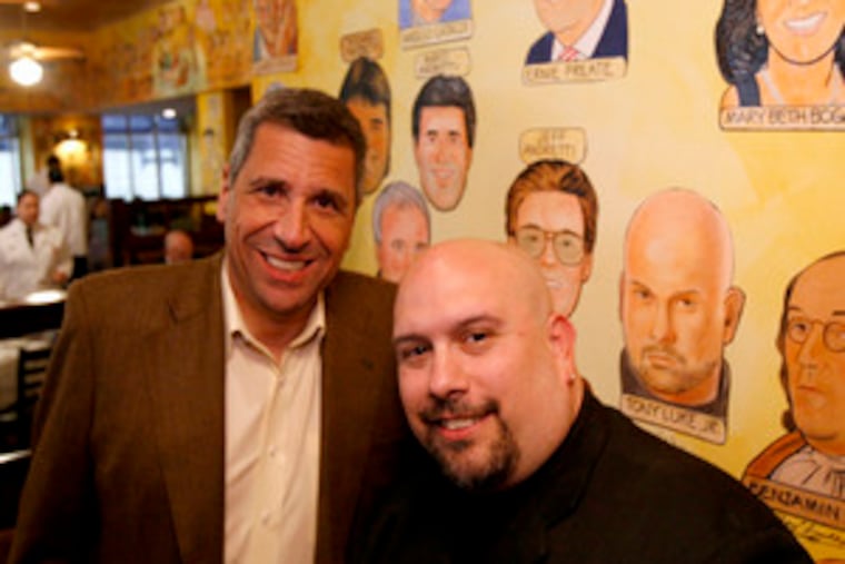 Angelo Cataldi and Tony Luke Jr. (right) got their caricatures on the wall - plus a serenade - at the Palm Restaurant. (See "Facing the Music.")