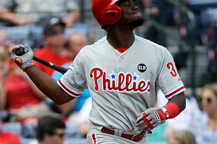 Philadelphia Phillies' Odubel Herrera flies out in the fourth inning
of a baseball game against the Atlanta Braves Sunday, Sept. 20, 2015,
in Atlanta.
