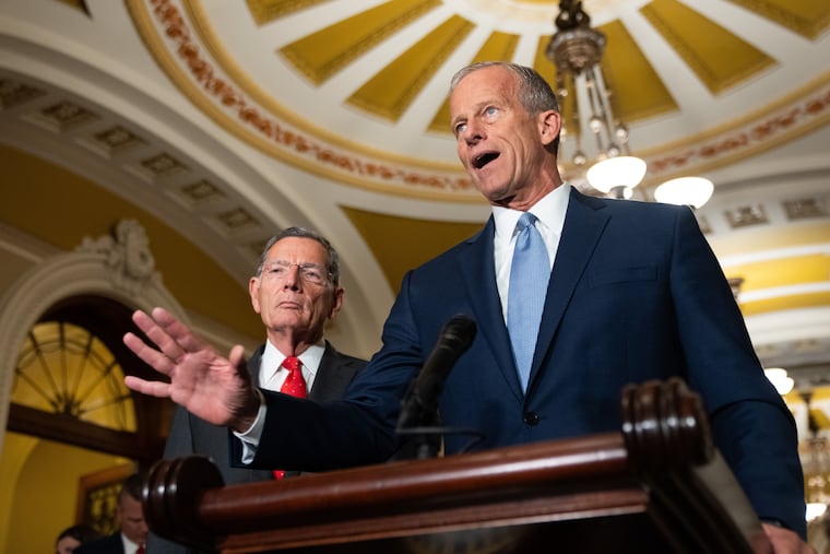 Senate Majority Leader John Thune, R-S.D., speaks to reporters following a weekly policy luncheon at the Capitol in Washington, Tuesday, July 21, 2026. (AP Photo/Allison Robbert)
