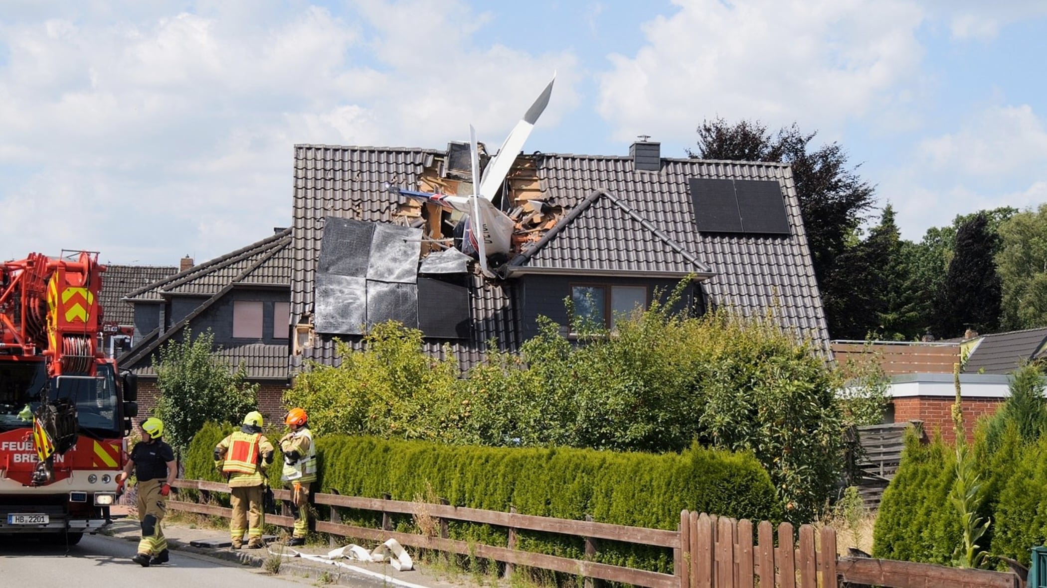 Small plane crashes into a home in northern Germany, leaving 1 dead and 1 missing