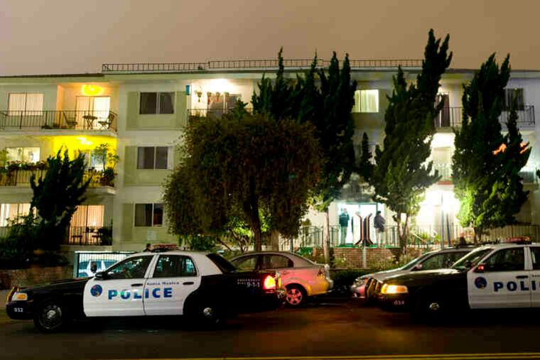 Police and FBI surround the apartment building in Santa Monica, Calif., where James "Whitey" Bulger and his girlfriend, Catherine Greig, had lived and were arrested.