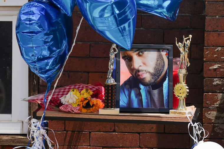 A memorial to Joseph Wamah Jr., who was killed before the shooting rampage, at his home in Philadelphia.