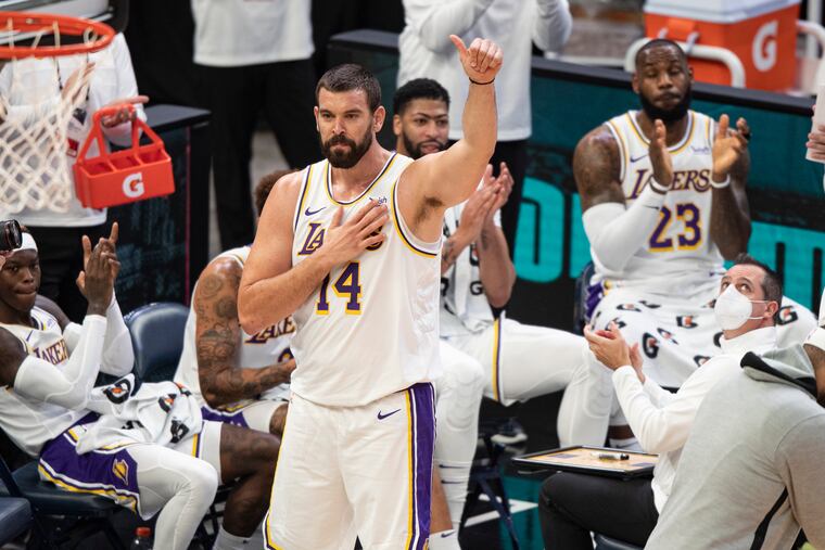 Lakers center Marc Gasol (14) has held Sixers center Joel Embiid to 30% shooting in eight head-to-head regular-season matchups.