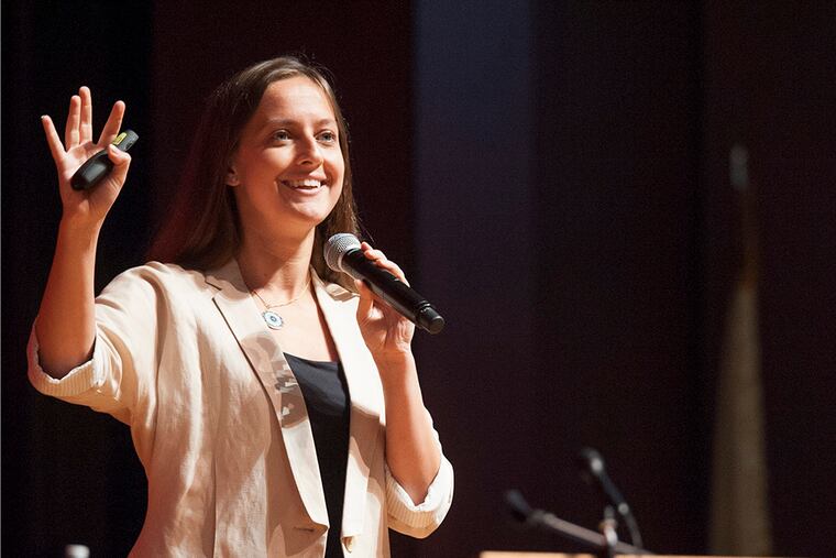 Kristina Anderson, 28, speaks at the school safety conference at Washington Township High School. (CLEM MURRAY / Staff Photographer)