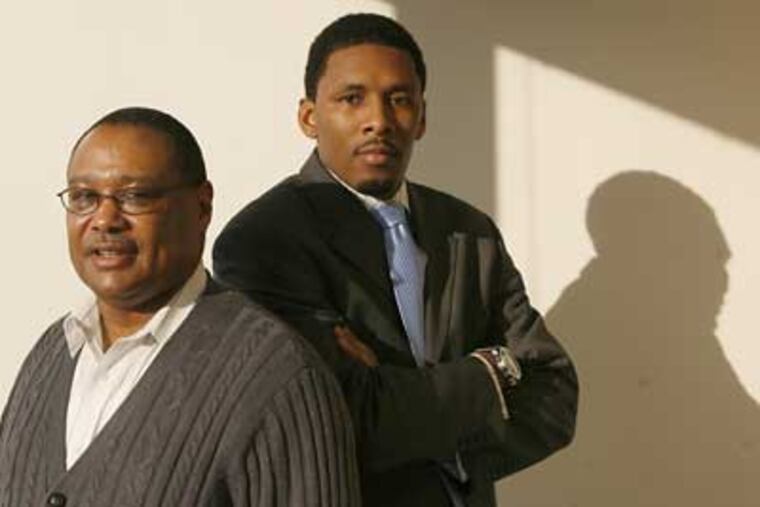 Eric Ward, left, CEO and Executive Producer, and his son Shareef Ward, Production Manager, are shown in the offices of the "Keepin' It Real Tour." The tour aims to motivate urban youth through speakers and life skills. (Charles Fox / Staff Photographer)