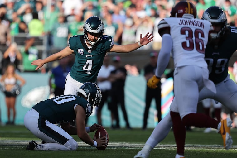 Eagles kicker Jake Elliott sends a 54-yard field goal through the uprights to beat the Commanders in overtime.