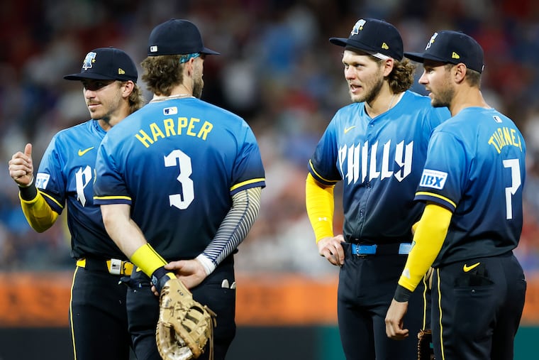 Phillies president Dave Dombrowski said the Phillies' infield is mostly set with (from left) Bryson Stott, Bryce Harper, Alec Bohm, and Trea Turner.
