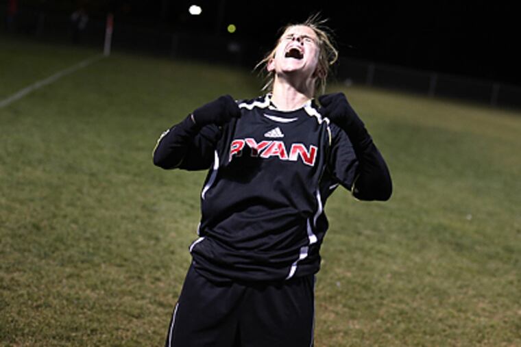 Archbishop Ryan's Megan Tole lets out a yell to celebrate her team's 1-0 victory over Archbishop Wood in the Catholic League girls soccer championship game. (Eric Mencher / Staff Photographer)